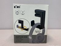 Front view of KOWEI headphone hook packaging, showing product image and key features including 360° rotation and USB ports.