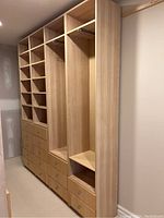 Full assembled modular closet system showing two shelving modules and two hanging modules with drawers.