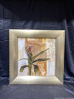 Frontal view of the framed botanical painting featuring a plant with a blooming flower.