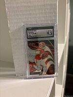 Front view of 2018 Panini Select Tyreek Hill football card graded 9.5 by CSG, showing player action image and grading label.