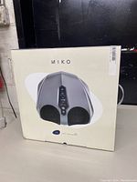 Box front showing Miko Y11 Foot Massager image and branding.
