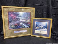 Both framed prints displayed against a black backdrop, showing sizes and overall framing styles.