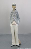 Full front view of the figurine showing height, posture and front detailing