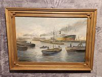 Front view of painting in carved gilt wood frame