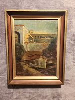 Front view of the oil painting showing a skeleton on a stone wall with landscape background.