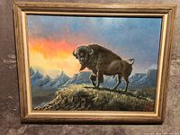 Front view of buffalo oil painting showing entire artwork and frame