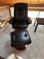 Front view of chair and ottoman showing overall condition