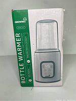 Box packaging of the Grownsy Bottle Warmer showing the product image and branding.