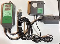 Full view of all components: digital controller, CO2 sensor module, and power outlet controller with cables connected.