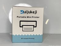 Front view of the Huijukeji Portable Mini Printer box showing brand and model information.