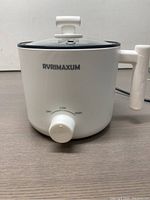 Front view showing RVRIMAXUM logo and temperature control knob with Off, Low, High settings