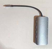 Top view of the computer USB-C hub showing ports on the side: HDMI, USB 3.0 ports, SD and microSD card slots