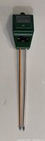 Front view of 3-in-1 soil tester meter showing analog dial and two metal probes