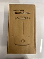 Photo of the Ultrasonic Humidifier box showing a line drawing of the humidifier device with the label Ultrasonic Humidifier.