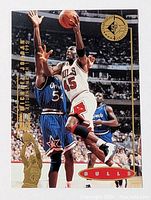 Front side of the 1994-1995 Michael Jordan basketball card showing his jump shot and defending players.
