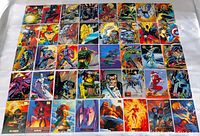Full view of all 40 Marvel superhero cards laid out to show artwork on each card, showing a variety of characters and bright colors.