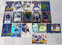 Full lot of Toronto Maple Leafs hockey cards displayed on flat background showing different players and card styles including inserts and limited editions