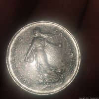 Obverse side of the 1970 French 5 Francs coin showing the walking woman figure with 'République Française' inscription.