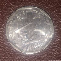 Obverse side of French 2 Francs coin showing Jean Mourgon with hat and cross background, dated 1992