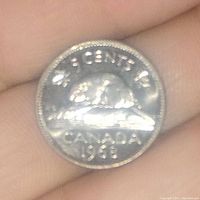 Reverse side showing beaver design, denomination, and year 1968.