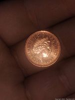 Obverse side showing Queen Elizabeth II portrait, date 1998, and inscriptions.