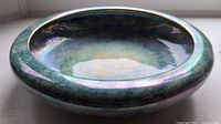 Full view of the Grimwades Byzanta Ware lustre bowl showing its circular shape and iridescent finish.