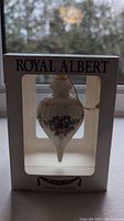 Front view of the original box containing the Royal Albert ornament showing the brand and series name.