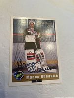 Autographed 1992 Classic Sports Manon Rheaume rookie card in near mint condition, showing front side with full image of player in goalie equipment and autograph.
