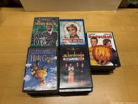 Photo showing a stack of DVDs including Saturday Night Live Chris Rock, Nurse Jackie, DodgeBall, Monty Python and the Holy Grail, and The Birdcage.