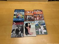 Photo of various TV show DVD box sets including Dallas, Greek, Fantasy Island, The Dick Van Dyke Show, The Andy Griffith Show, Barney Miller