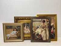 Four framed portrait serigraph prints leaning against a wall, showing composition and framing styles.