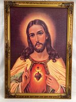Full view of the framed print of Jesus showing the entire image within an ornate gold frame on masonite board.