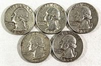 Obverse side of five Washington quarters dated 1952, 1959 (two coins), 1962, and 1964, showing profile of George Washington.