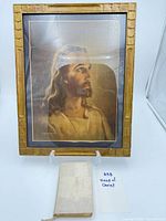 Framed lithograph and prayer book overview