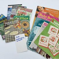 Top view of all nine craft booklets spread out