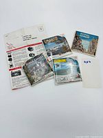 All four View-Master packet sets plus folded instruction sheet visible