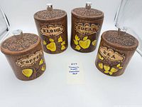 Full view of all four Treasure Craft canisters