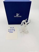 Figurine with presentation box and lot tag visible