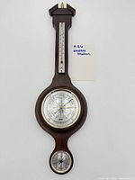 Full view of wooden banjo weather station