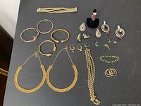 Overhead view of entire collection laid out on black surface