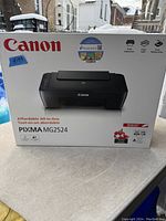 Front view of Canon PIXMA MG2524 printer box with branding and model name.
