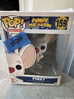 Front view of the boxed Pop! Animation Pinky the Brain vinyl figure #159 showing packaging and figure inside.