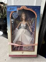 Vintage Barbie Tooth Fairy Doll still sealed in original box, showing front view of packaged doll and box details