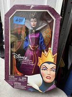 Photo of vintage Disney Evil Queen doll in original packaging, showing the doll and box details.