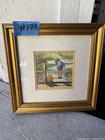 Front view of framed Winnie the Pooh print showing the artwork of Pooh and a boy looking over a wooden fence at a pond.