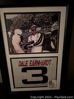 Front view of framed Dale Earnhardt photo with name and number 3 below.