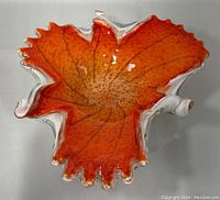 Top view showing free-form leaf shape and orange interior