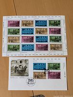 Sheet of 25 colorful 1945 uncut stamps with dates and color guide on margins