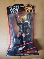 Full view of the WWE MVP wrestler action figure sealed in original blister packaging with colorful WWE branding and wrestler portrait on header card.