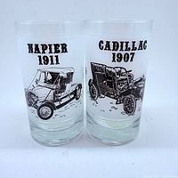 Front view of both glasses showing car illustrations and text